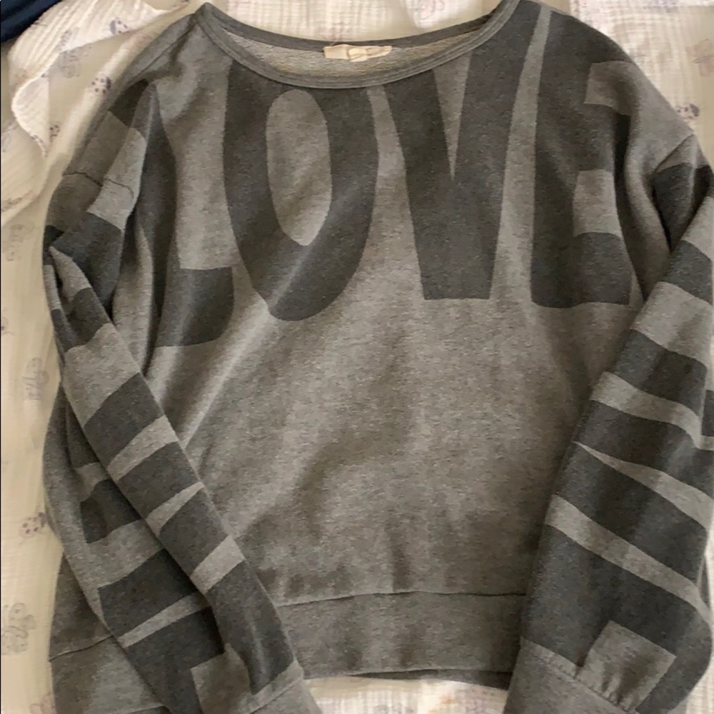 Cute love sweater.